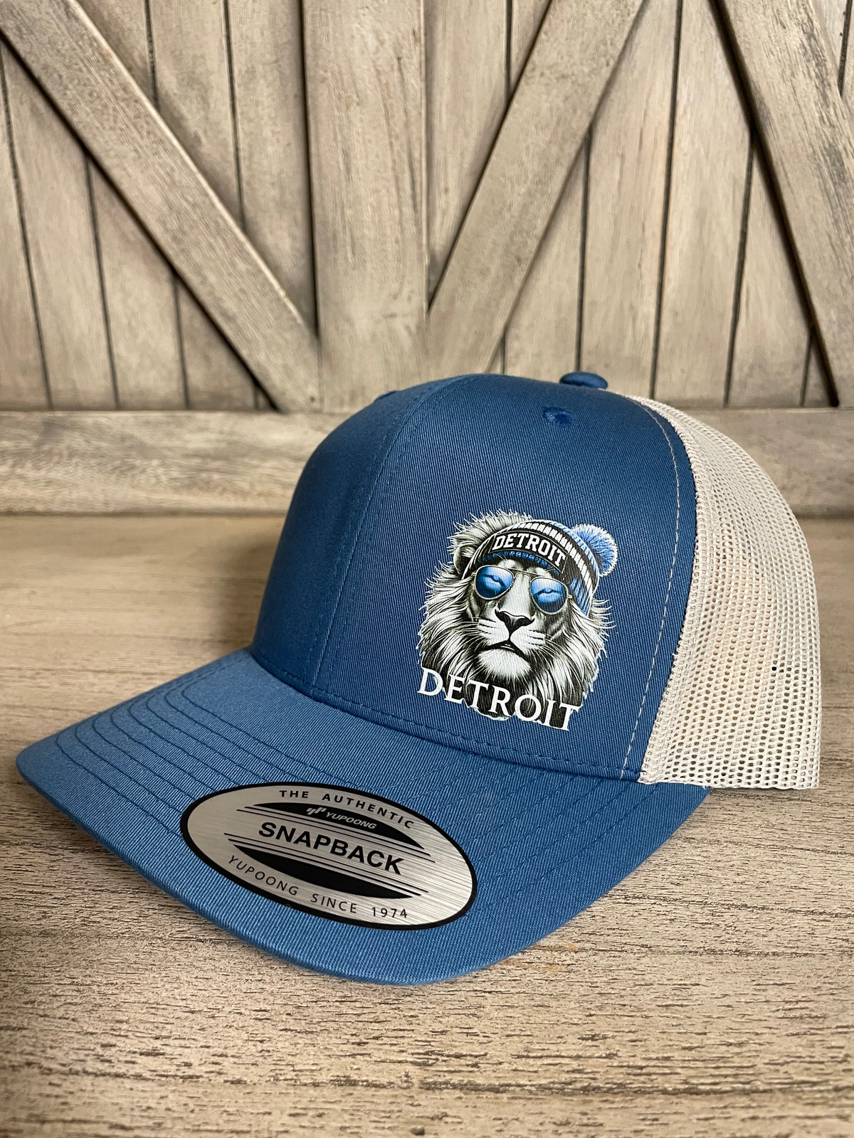 D. Lion Snapback