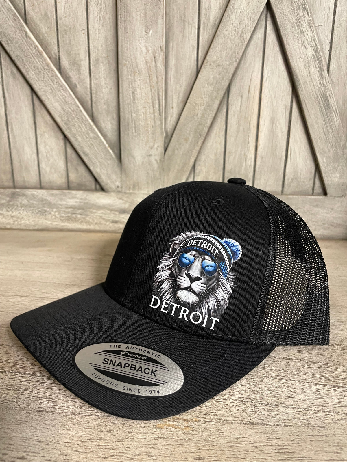 D. Lion Snapback