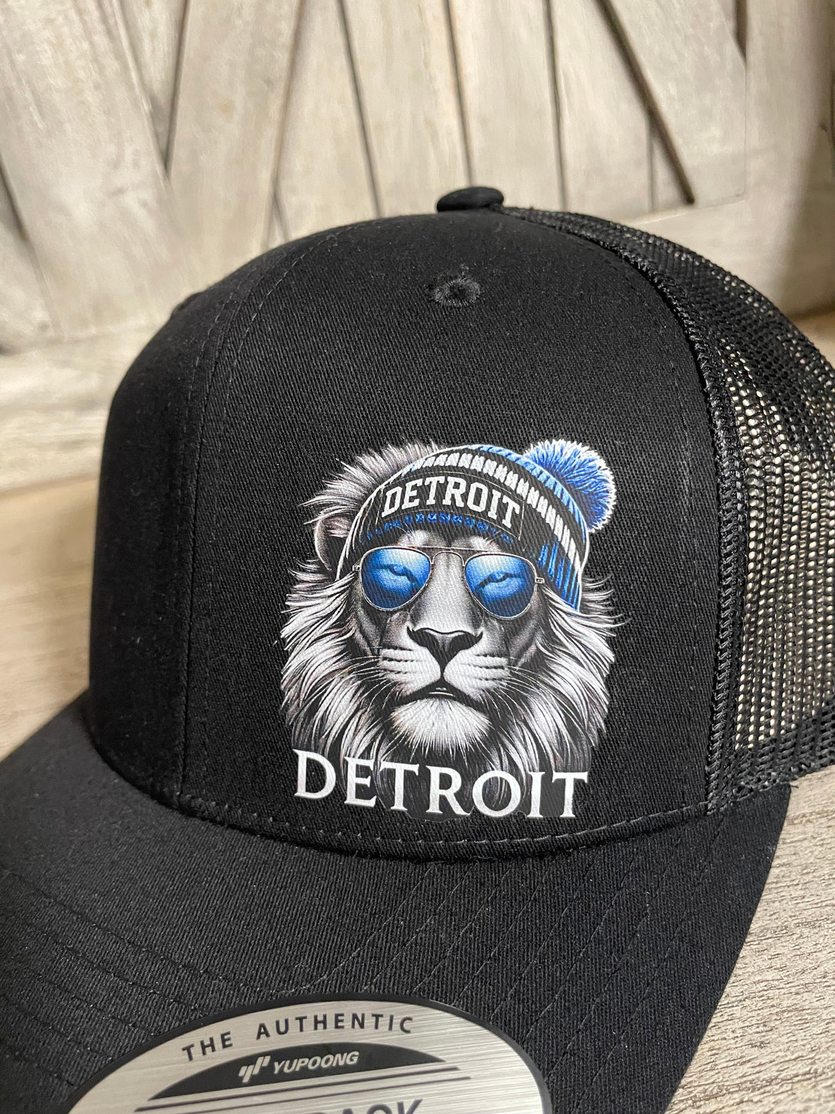 D. Lion Snapback